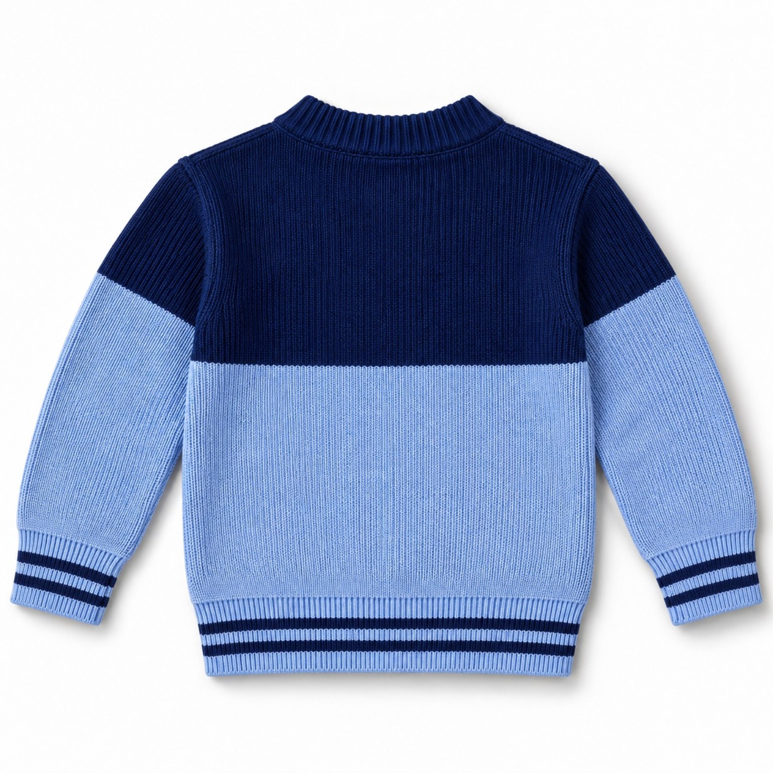 Back view of the Colorblock Sporty Sweater children’s blue knitted sweater showing navy and powder-blue colour blocking with striped cuffs and hem.